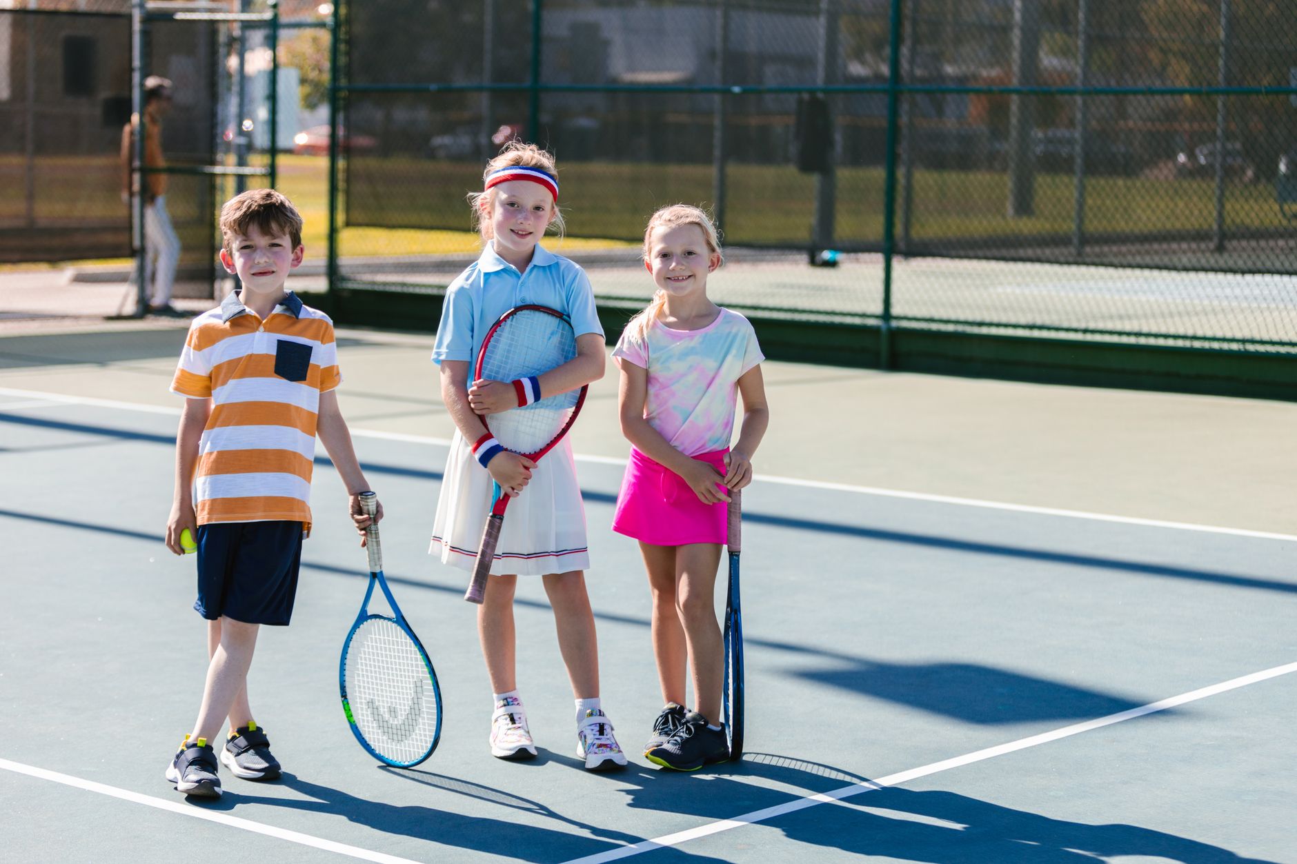 children tennis lesson court