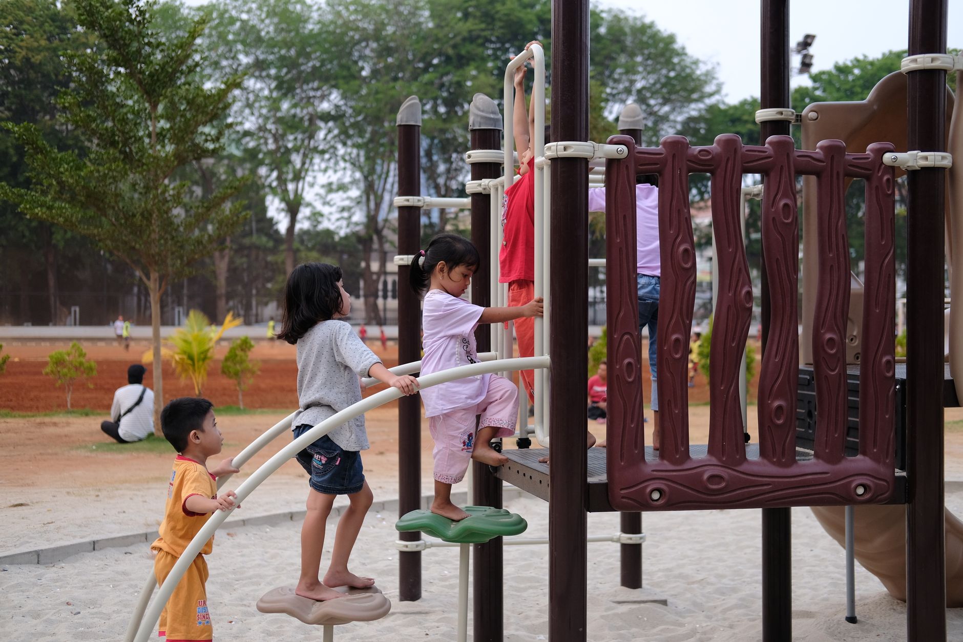 children climbing outdoor park