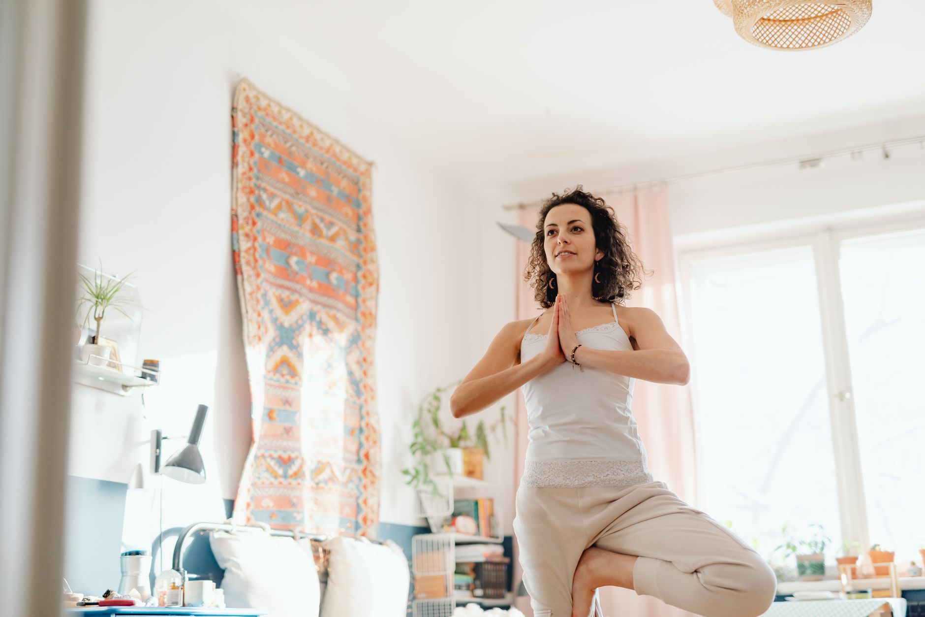 yoga mat propped against wall bedroom