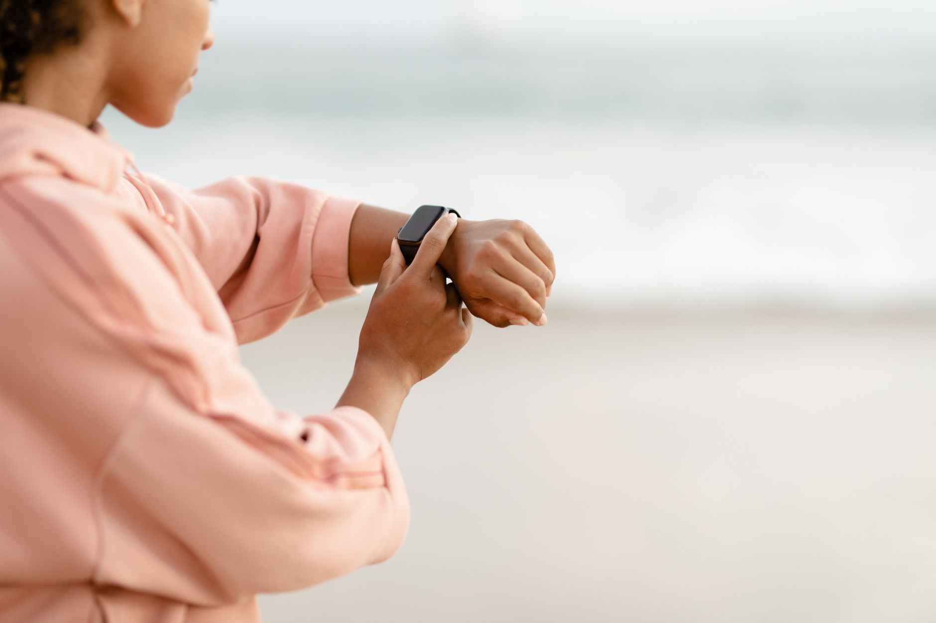 woman smartwatch wrist walking outdoor