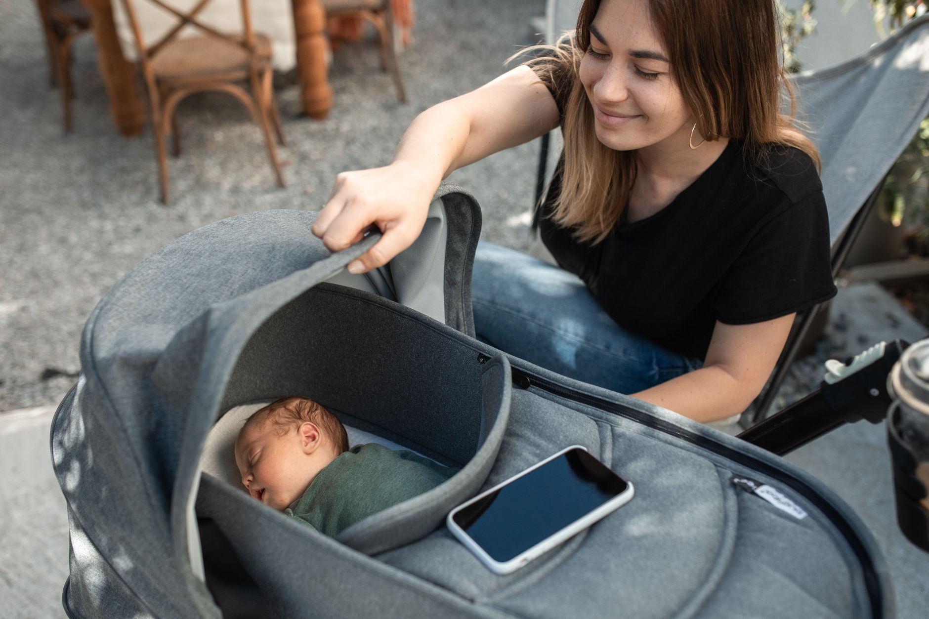 child sleeping stroller park